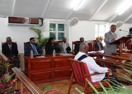 Premier of Nevis and Minister of Finance in the Nevis Island Administration Hon. Vance Amory delivering the 2013 Budget Address at the Nevis Island Assembly on April 26, 2013. Looking on are (L-R) Cabinet Secretary Mr. Stedmond Tross, Hon. Troy Liburd, Hon. Hazel Brandy-Williams, Mr. Theodore Hobson, Hon. Alexis Jeffers and Legal Advisor Mr. Colin Tyrell